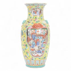 19th century Chinese famille rose yellow ground porcelain vase, of baluster form with twin applied mask ring handles, the body decorated with two shaped reserves mounted with dragon heads, depicting warriors at battle and at court, the neck with two smaller conforming figural reserves, upon a yellow ground decorated with exotic birds amidst scrolling blossom, H45.cm
