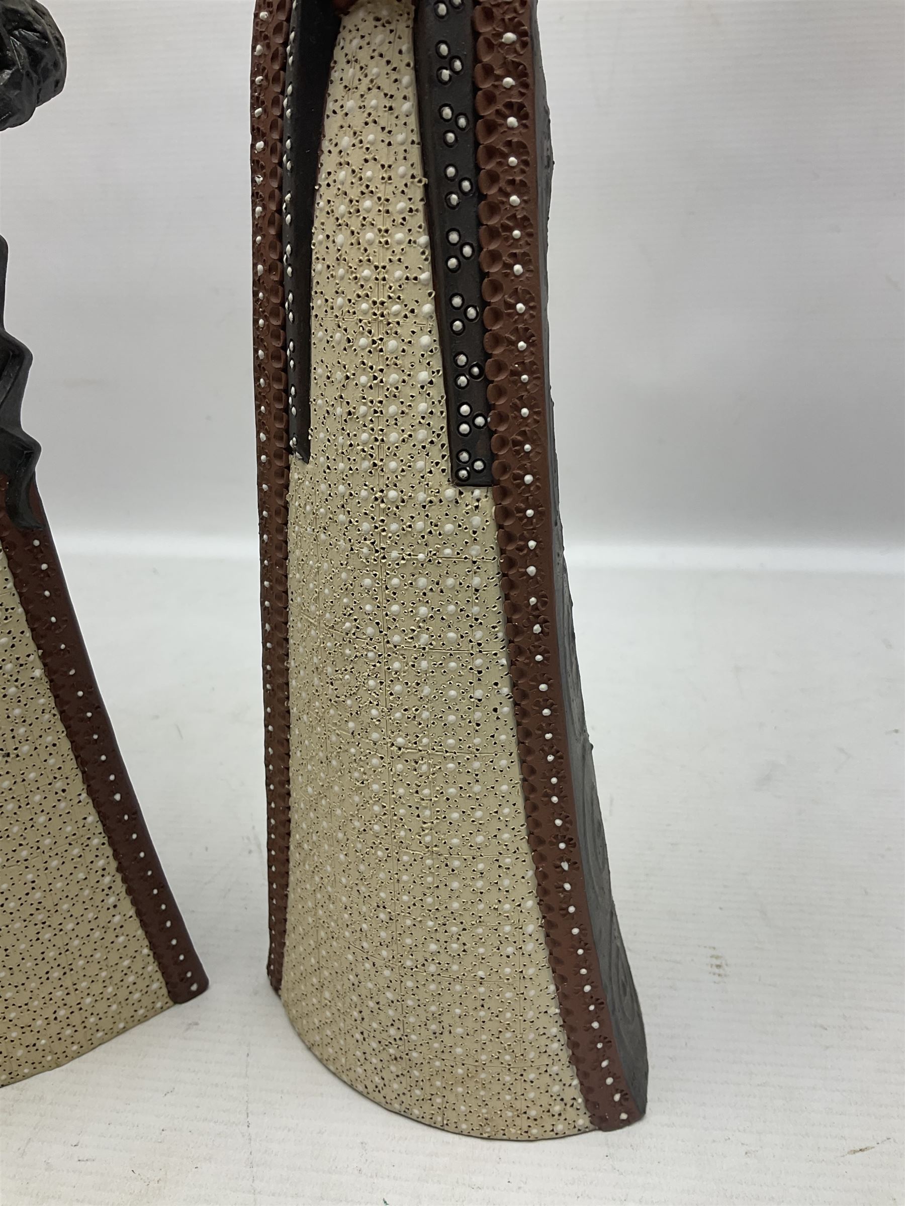 Leonard Stockley; two studio pottery figures modelled as a king and queen, both signed beneath,  H35cm