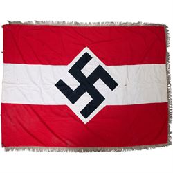 WWII German Third Reich Hitler Youth flag, with central swastika and later silver tress added to the edge