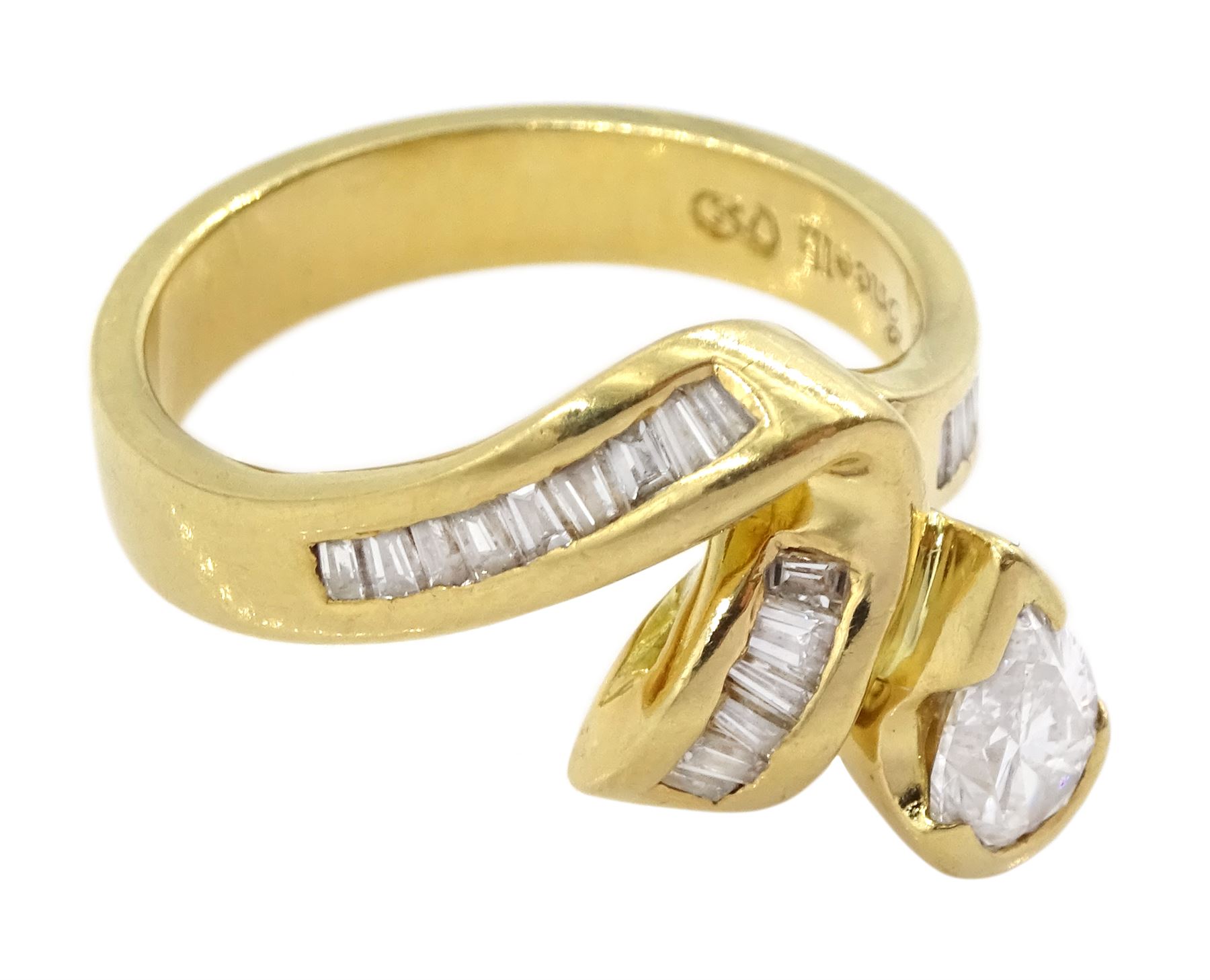 18ct gold diamond pear and baguette cut diamond ring, stamped 750, principle pear cut diamond of approx 0.75 carat, total diamond weight approx 1.25 carat