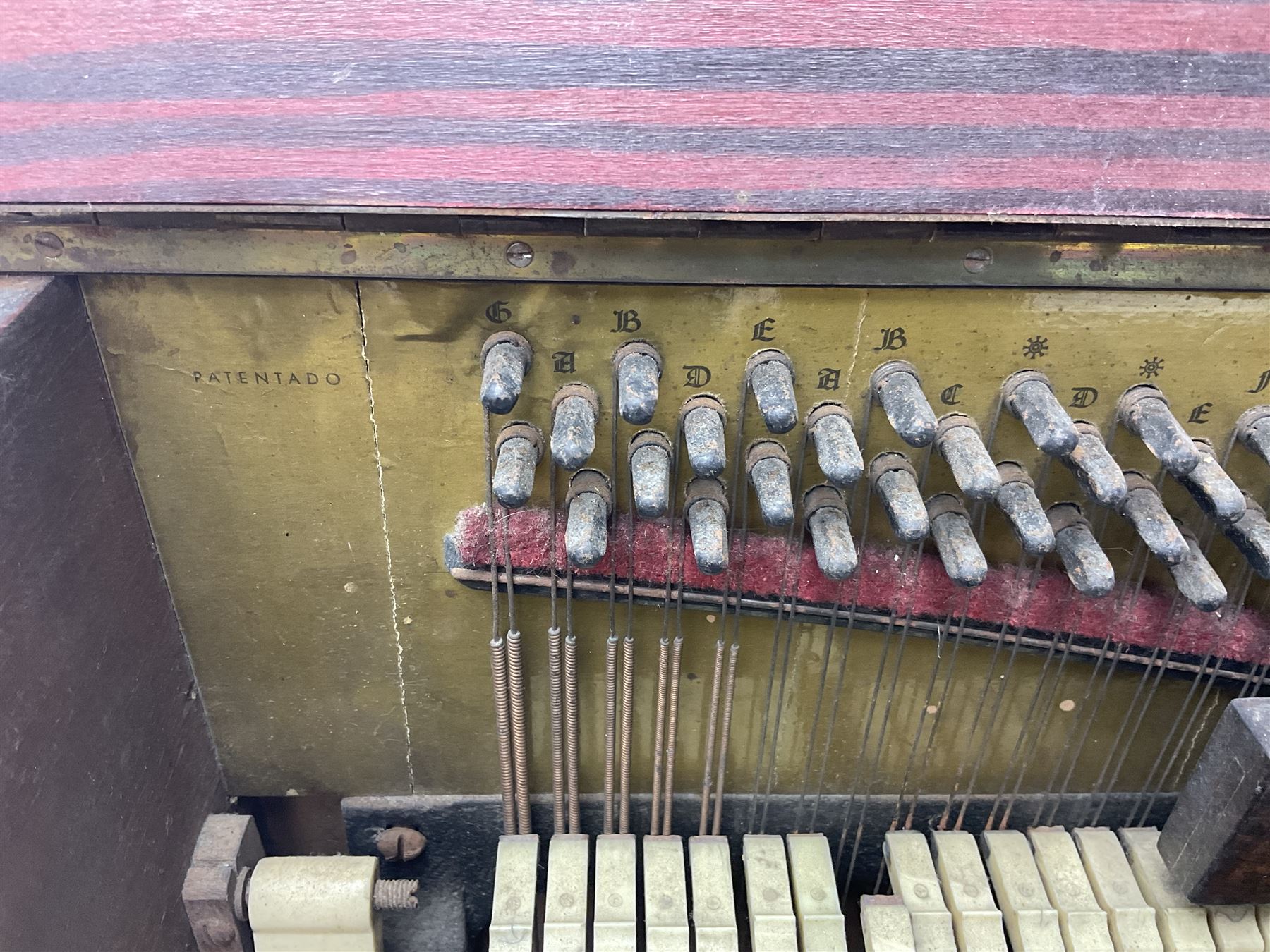 Faventia Half size miniature Spanish barrel piano with a 40cm cylinder playing tunes on a 37 note movement including woodblock and triangle, in a painted case with silk embroidered decoration to the front.  Vicente Linares, Barcelona trade label, with original crank handles, stringing, hammers action, tuning pins and cylinder