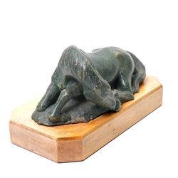 Mid-20th century painted terracotta figure of a recumbent horse, including wooden plinth W31cm