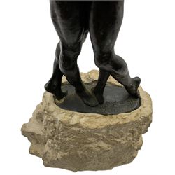 Composite sculpture embracing couple, after Joseph Bofill on a rocky base, height 33cm.