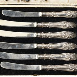 Silver tea strainer and stand Sheffield 1934, two sets of six silver handled pastry knives and three silver teaspoons