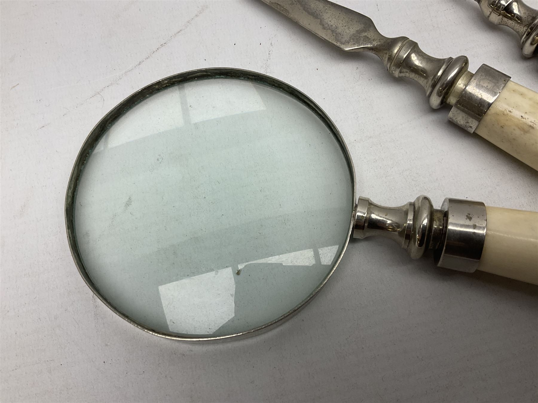 Magnifying glass, letter opener and shoe horn set, with bone handles and silver plated finials 