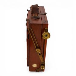 IVORY Early 20th century Taylor's Drug Co. The Albion half plate camera, with brass lens two plates numbered 2 and 4,and accessories, in leather carry case