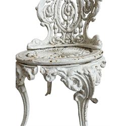 Pair of Victorian white painted cast iron garden chairs, the cresting rail with cartouche over scrolls and trailing bellflower decoration, circular seat on scroll cast cabriole supports