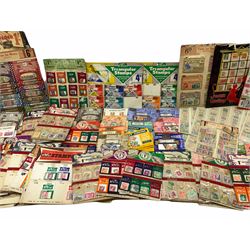 Collection of stamps including packets still mounted to the original shop cards, reading 'A Darracott Product Stamps 1d per pkt' etc, Countries include China, Spain, Argentina, Liberia, Denmark etc, in one box