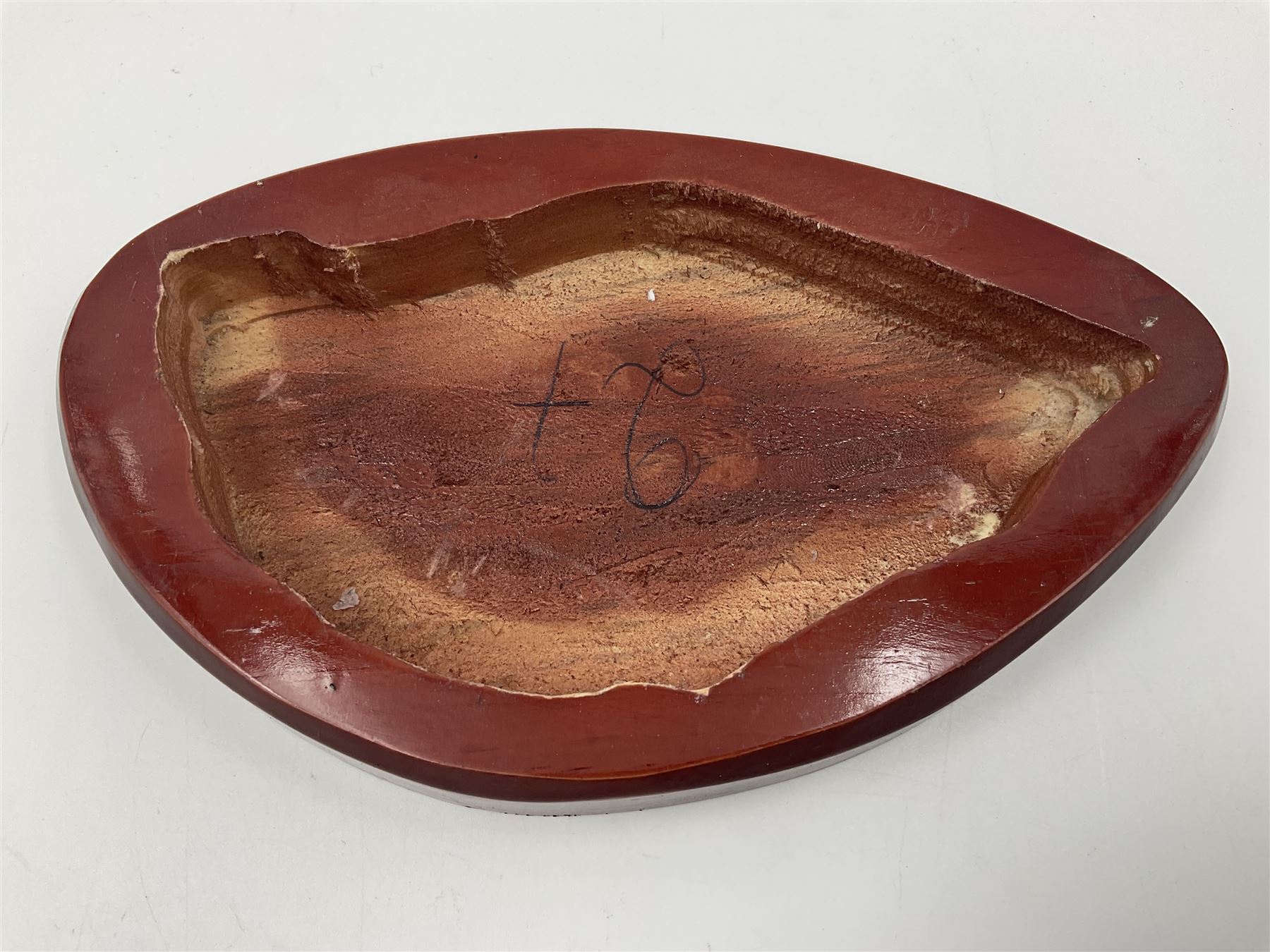 Amethyst crystal geode cluster, with well-defined crystals of various sizes, upon a carved wooden stand, H12cm, L20cm