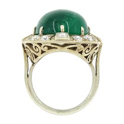 Gold emerald and diamond ring, the central oval cabochon emerald, with sixteen round and rectangular cut diamond halo surround by Judith Crowe, hallmarked 9ct, emerald 20.00 carat, total diamond weight 2.00 carat, with World Gemological Institute report