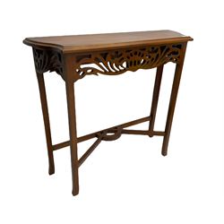 Mahogany console table, shaped moulded top over pierced apron, square supports