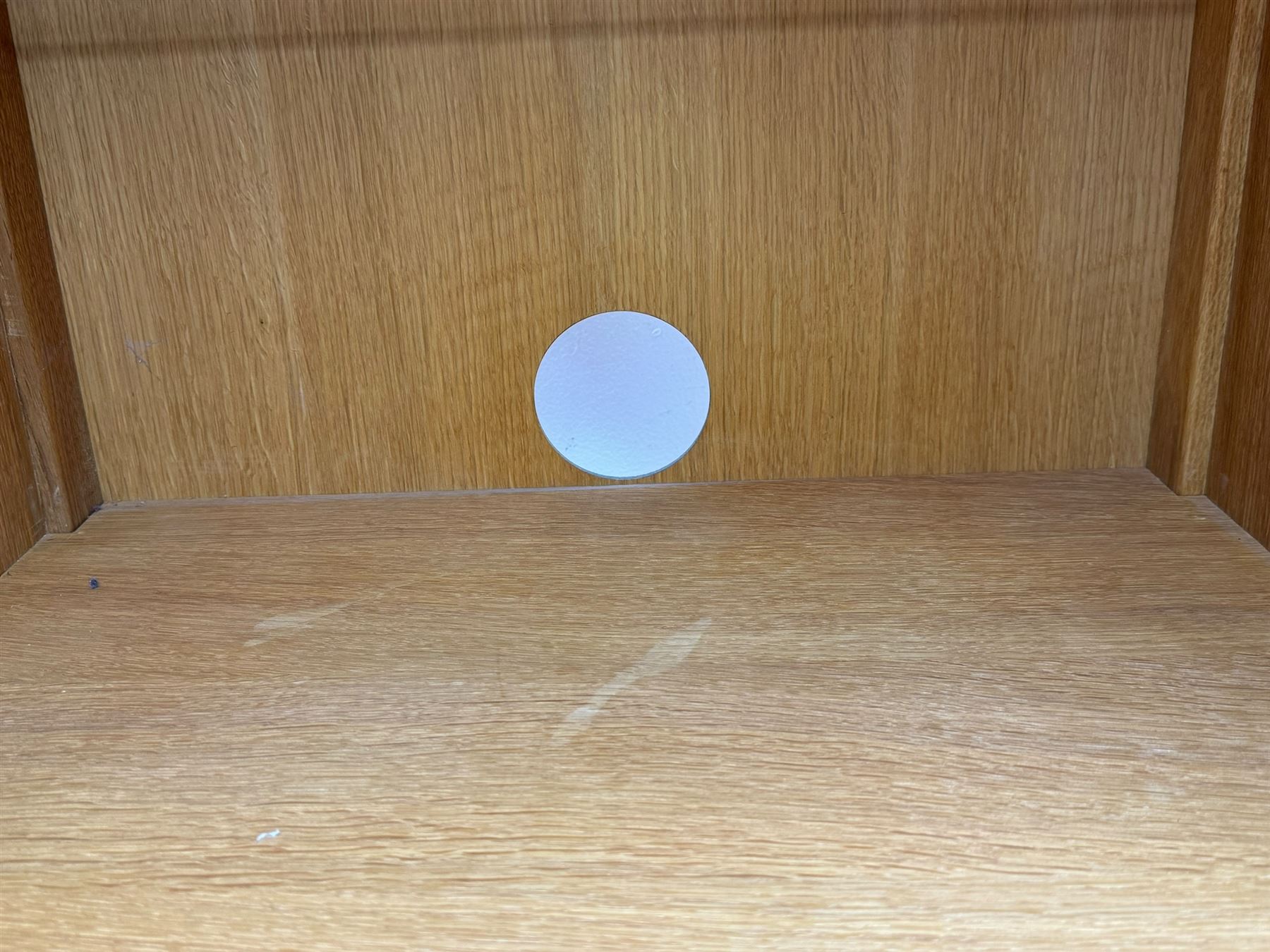 Laura Ashley - contemporary Milton oak display cabinet, featuring single door with two glass panels and pewter effect handle, enclosing one fixed oak shelf and two adjustable glass shelves, access hole at the bottom shelf, over single drawer with matching handle, on square legs