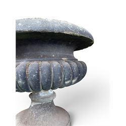 Carved sandstone garden urn, gadrooned campana form