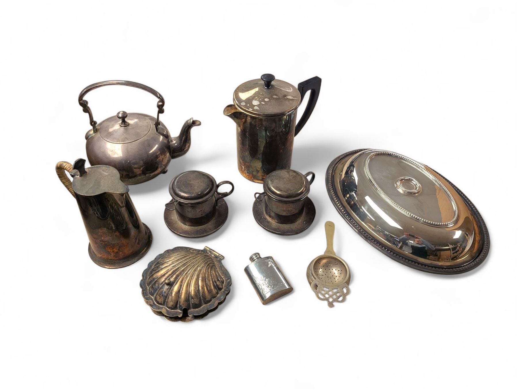 Collection of silver plate, including shell butter dish,  cafetiere, wicker handled coffee pot, etc
