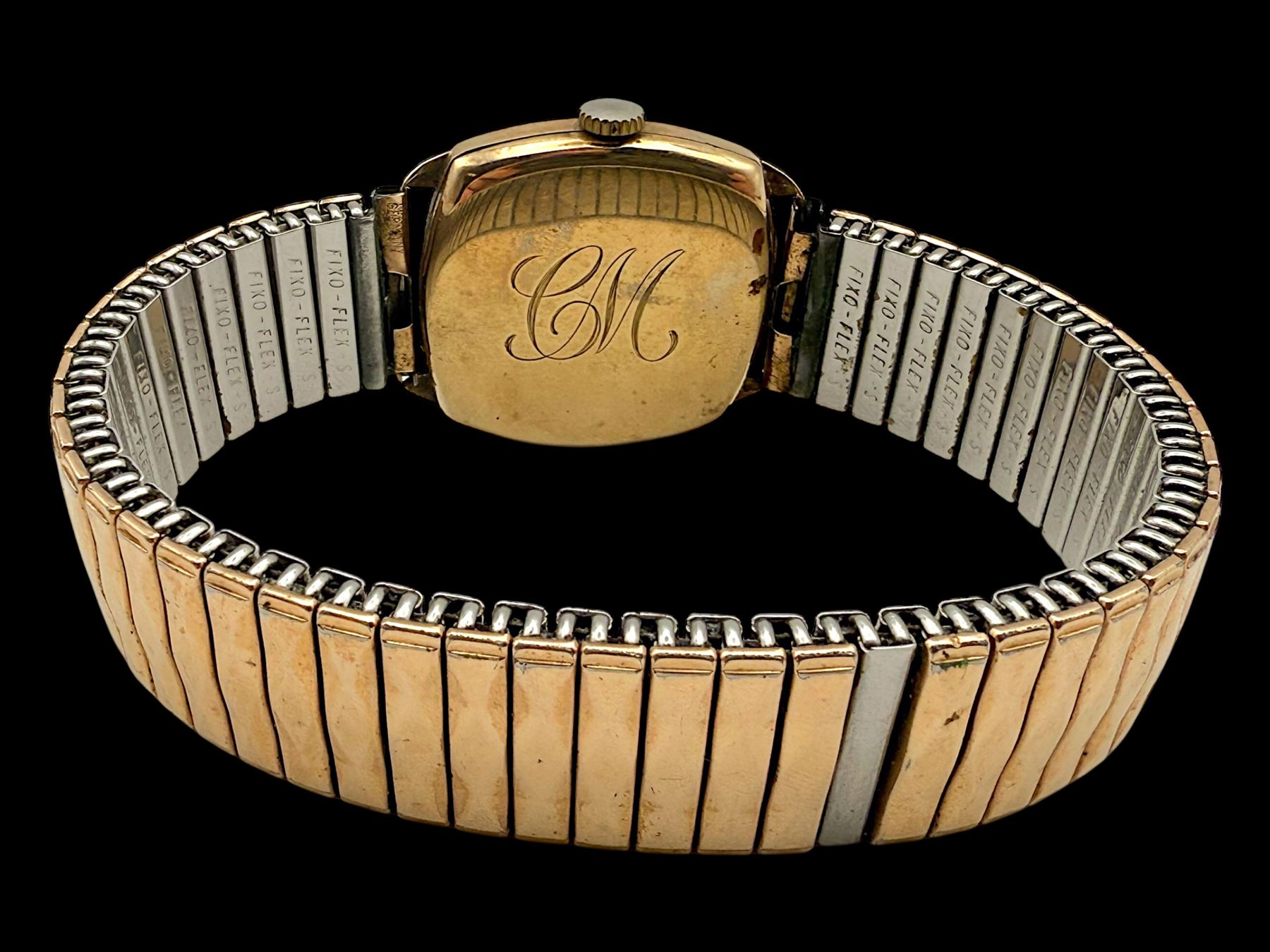 J W Benson 9ct rose gold manual wind wristwatch, the back case engraved with initials CM, Birmingham 1942, on expanding gilt strap 