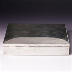 German 925 standard silver cigarette box with hinged lid  and a silver bottle coaster with turned wood base London 1986 Maker M C Hersey & Son