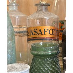 Collection of antique glass bottles and jars, including an apothecary bottle with gilt paper label, three Cranwell drinks bottles, two fish neck bottles, and a group of chemists preparation paste pots.  - COLLECTION BY APPOINTMENT FROM: The White House, Thirsk Road, Easingwold, York, YO61 3NF - CALL 01723 507111 TO ARRANGE
