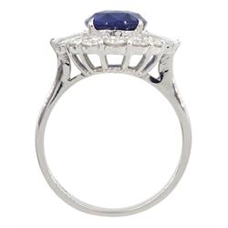 18ct white gold oval sapphire and tapered baguette diamond cluster ring, stamped 750, sapphire 3.63 carat, total diamond weight 0.98 carat, with World Gemological Institute Report