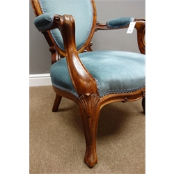  Victorian walnut framed open armchair, floral carved cresting rail, serpentine seat, shell carved cabriole legs, W63cm  