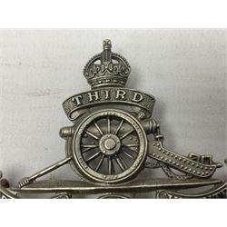 Third Middlesex Royal Garrison Artillery Volunteers Cap Badge, white meta Royal Artillery cap badge with “THIRD” to the top scroll and lower three part scroll “MIDDLESEX – R.G.A. – VOLUNTEERS”. Three lug fittings to the reverse.
