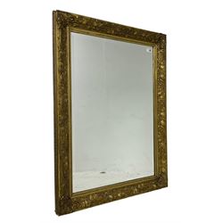Art Nouveau design gilt framed mirror, frame decorated with poppies and interlaced foliage, rectangular bevelled plate