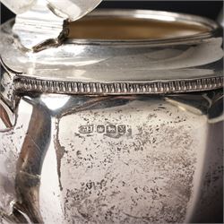  Silver tea set comprising teapot, hot water jug, sugar bowl and milk jug of circular panel sided design Sheffield 1941 Maker Harrison Brothers & Howson 