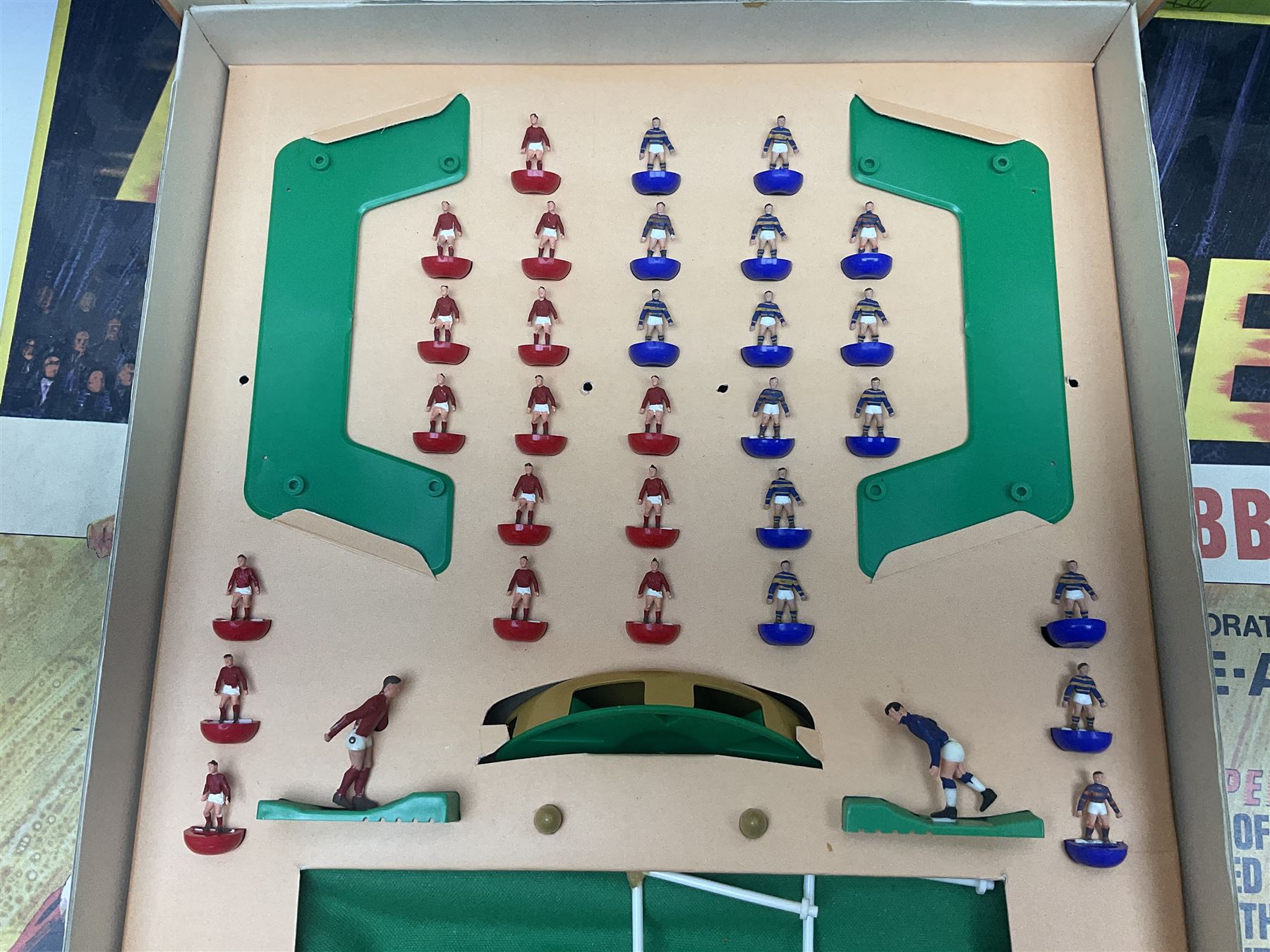 Subbuteo - three boxed sets comprising Football Express with two five-a-side teams and floodlighting; Continental with four teams and accessories; and International Edition Table Rugby with two teams; together with a Real Madrid 1974-75 League Champions pennant (4)