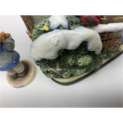 Eight Christmas Hummel figures by Goebel, to include Wintertime Chapel candle holder, Winter Fun, Christmas Morning, Christmas Time and Gingerbread Lane, tallest H21cm
