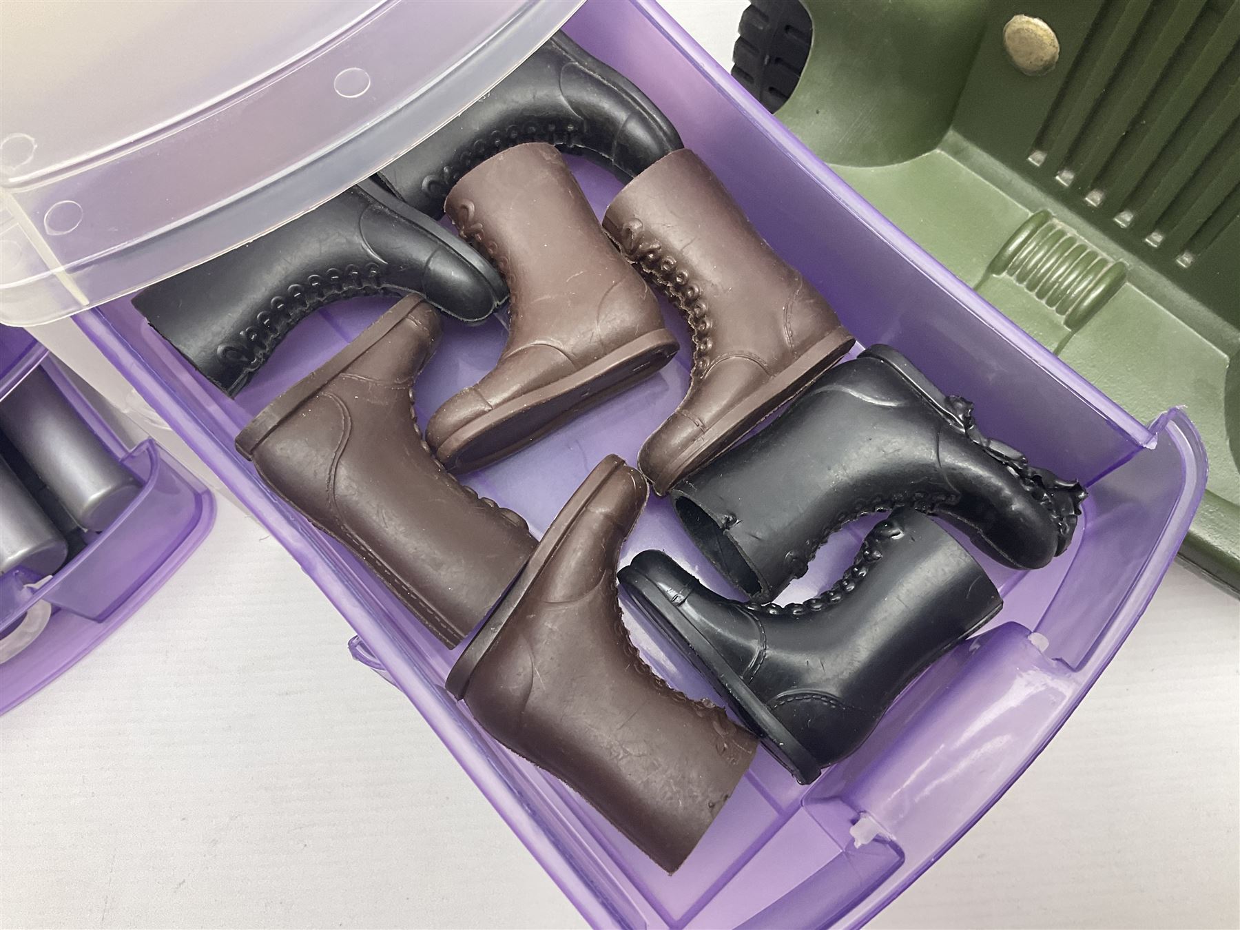 Action Man - five figures marked on the back 'Made in England by Palitoy under licence from Hasbro 1964', one dressed as a German Stormtrooper, one as a Red Devil Pilot and three in army uniform; another similar action figure marked to the right buttock ' G.I. Joe Copyright 1964 by Hasbro Patent Pending Made in Canada' dressed in army uniform; together with an Action Man jeep, field gun, mortar and machine guns and other accessories including helmets and weapons, parachute, diving equipment, skis and snow shoes, boots, uniforms etc; all unboxed