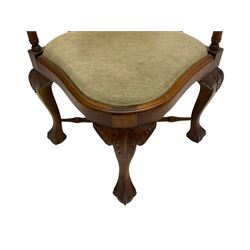 Georgian design mahogany corner chair, with pierced and carved splats, shaped and moulded seat with drop in cushion, on acanthus carved cabriole supports with ball and claw feet, joined by turned x-framed stretchers 
