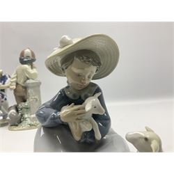 Three Lladro figures, Faithful Steed no 5769, Best Foot Forward no 5738 and Lambkins no 5469, all with original boxes, largest example H21cm 
