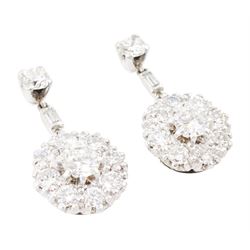 Pair of 18ct white gold diamond cluster pendant stud earrings, cluster of round brilliant cut diamonds, suspending from a single baguette cut diamond a further round brilliant cut diamond, total diamond weight approx 1.70 carat