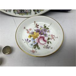Royal Crown Derby trinket dishes, together with a number of paperweight stoppers and a Wedgwood calendar plate 