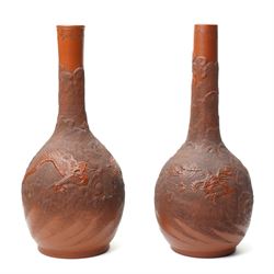 Pair of Chinese redware vases in the Yixing style, early 20th century, decorated with drag...