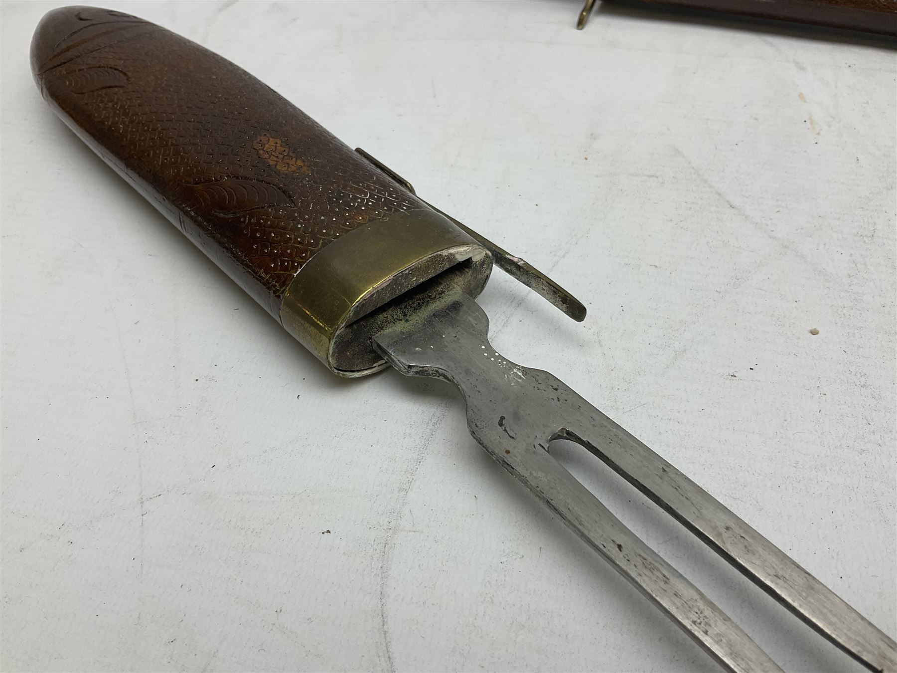 Early 20th century Indian wooden fish scabbard knife and fork serving set, together with other carving instruments with antler handles to include a Walker & Hall example