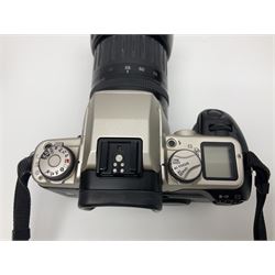 Canon EOS 50e camera body, serial no 8305671 with 'Canon Zoom EF 35-135mm 1:4-5.6' lens together with Halina 35X super camera body, with 'Halina Anastigmat f.c. 1:3.5 f=45mm' lens and other camera equipment 