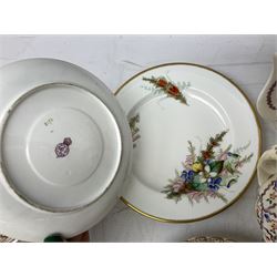 Two Royal Worcester tea cups, with one saucer and dessert plate, hand painted with British flowers and heather sprays and saucer, together with two Dresden tea cups and saucers, and various pink luster tea wares  