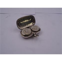 Edwardian silver sovereign and half sovereign case, of oblong form with engraved vacant cartouche and foliate scroll decoration to exterior, the interior with two engine turned sprung platforms, hallmarked Samuel M Levi, Birmingham 1903, approximate weight 0.81 ozt (25.4 grams)