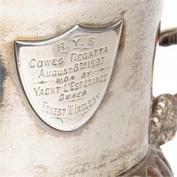 Pair of Edwardian silver plated wine coolers of campana form with twin handles and shield shape cartouches, inscribed 'Cowes Regatta 1907' H23cm
