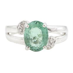 18ct white gold oval cut Paraiba tourmaline and round brilliant cut diamond ring, Birmingh...
