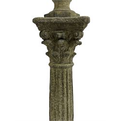 Classical design cast stone female bust depicting Artemis, raised on fluted Corinthian column with acanthus leaf capital, stepped square base, looking right 