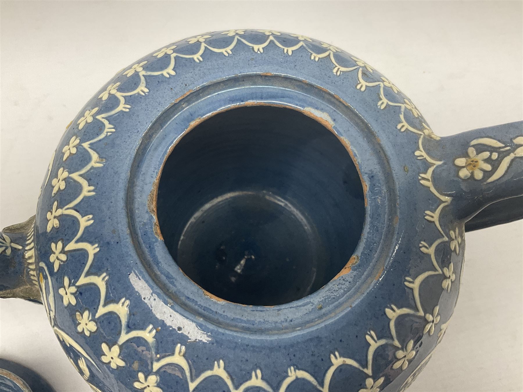 Swiss Thun pottery teapot and cover, decorated with edelweiss flowers, H16cm