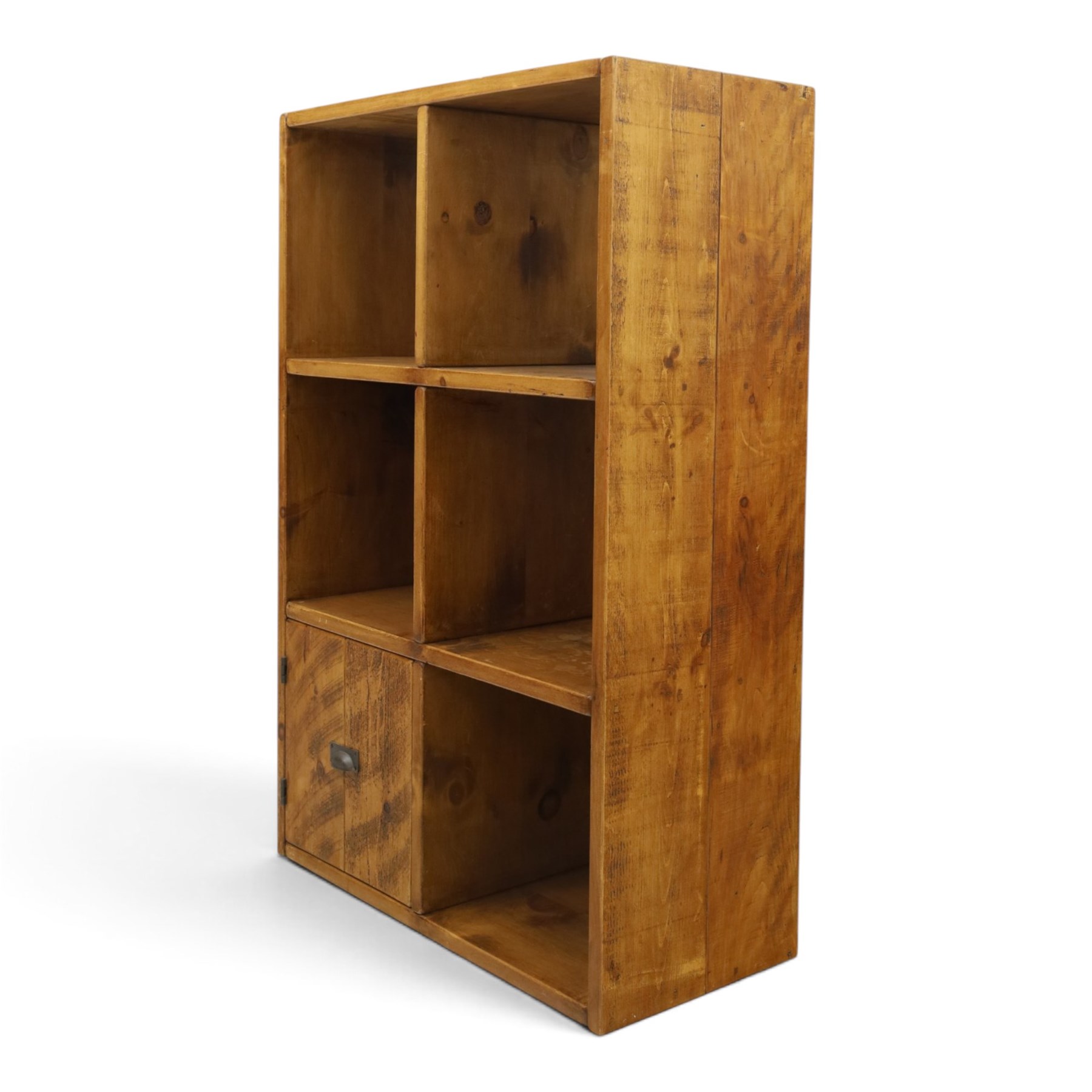 Indigo Furniture - rustic oak shelving unit with cupboard, five open shelves with a cupboard to the lower left, metal cup handles