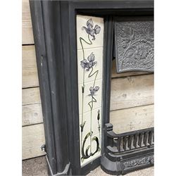 The Gallery Collection Fireplaces - 'Edwardian' cast iron fireplace, the hood decorated with interlacing floral design, with Art Nouveau inspired upright tiles