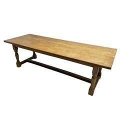 Large 20th century oak refectory dining table, on turned supports joined by H-frame stretchers