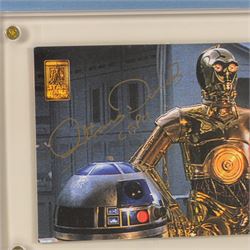 Signed Star Wars prints, comprising Rogue One Cineworld poster signed by Spencer Wilding (Darth Vader), portrait of Lando Calrissian signed by Billy Dee Williams, still of Boba Fett and Jango Fett signed by Daniel Logan and Temuera Morrison and a still of Darth Maul signed by Ray Park, R2-D2 signed by Kenny Baker and a C-3PO montage signed by Anthony Daniels, all framed 