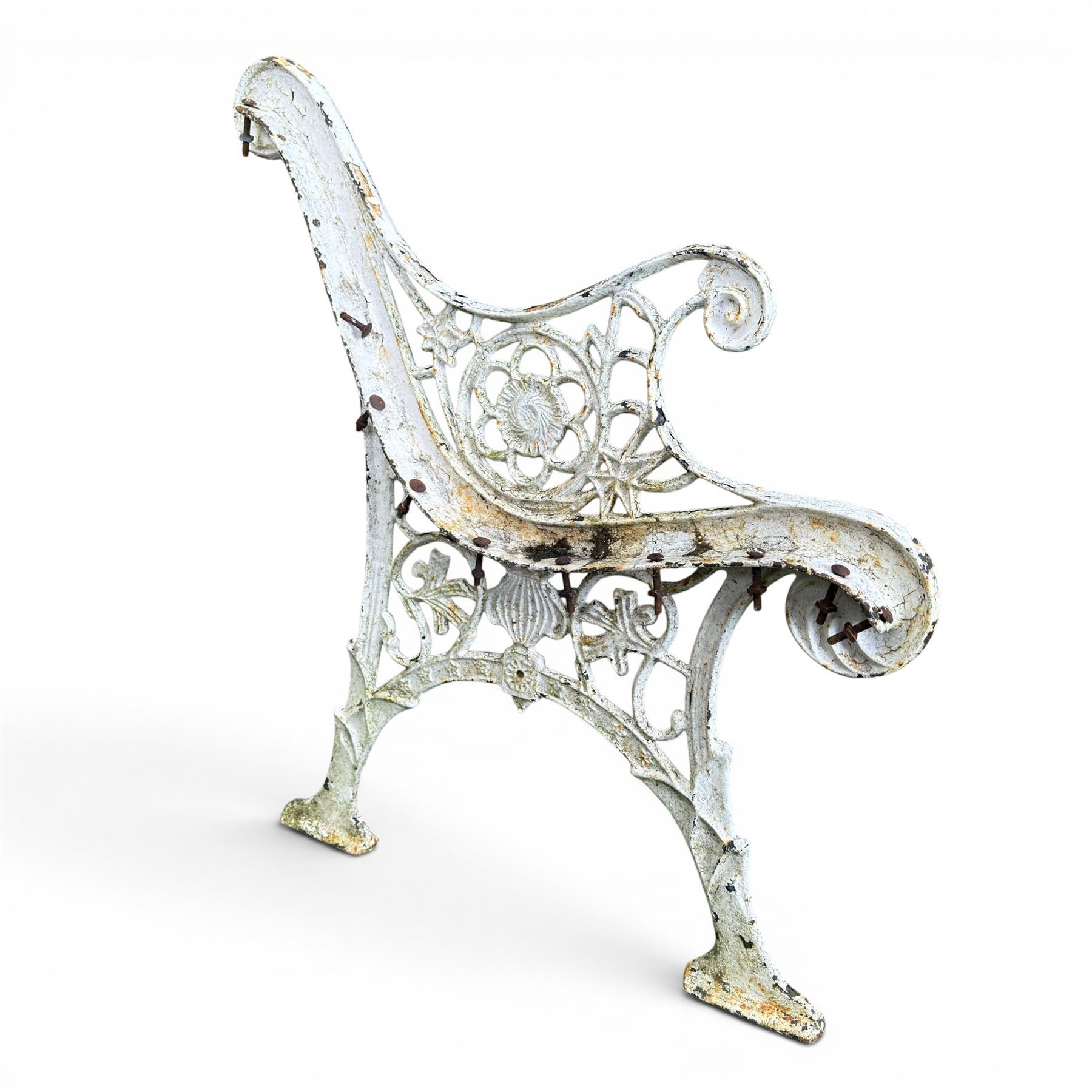 Pair of ornate painted cast iron bench ends, painted in white finish