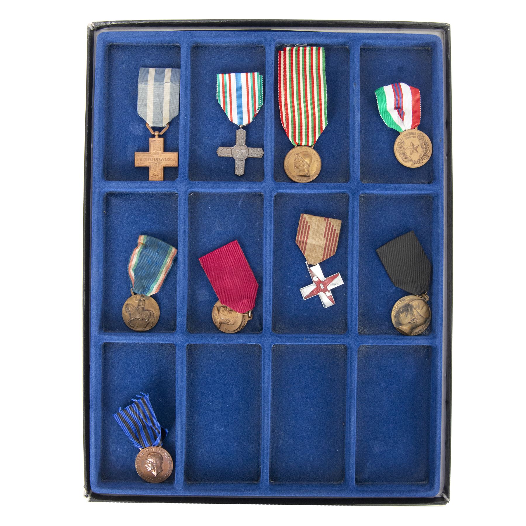 Collection of nine Italian medals, from WWI and WWII, including War Cross , Vittorio Veneto, 1914-18 war medal, Fascist GIL 2nd class, MVSN Colonial, Mussolini medal, Bersaglieri 1934 medal, Ethiopia war medal etc