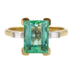  18ct gold three stone octagonal cut emerald and baguette cut diamond ring, hallmarked, emerald approx 2.15 carat