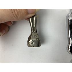 Nickel plated car mascot as a nude lady in a diving pose, similar to an A.E. Lejeune 'Speed Nymph', but marked 'N.L.C. Co. RegEd Des.'; chrome leaping Jaguar car mascot; and quantity of car model name letters, numbers and logos including Mercedes-Benz etc